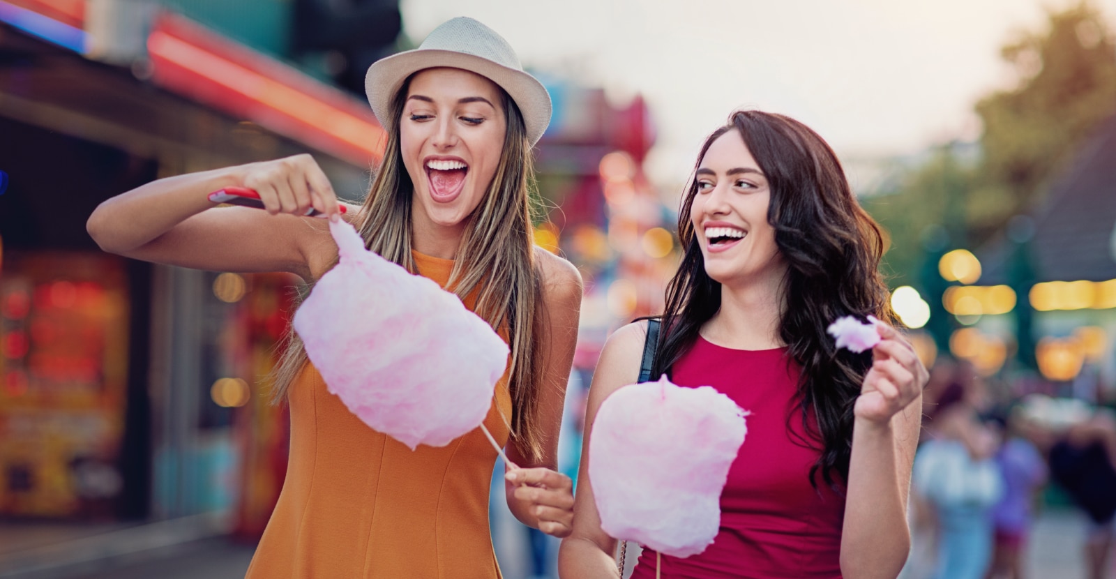 women eating cotton candy