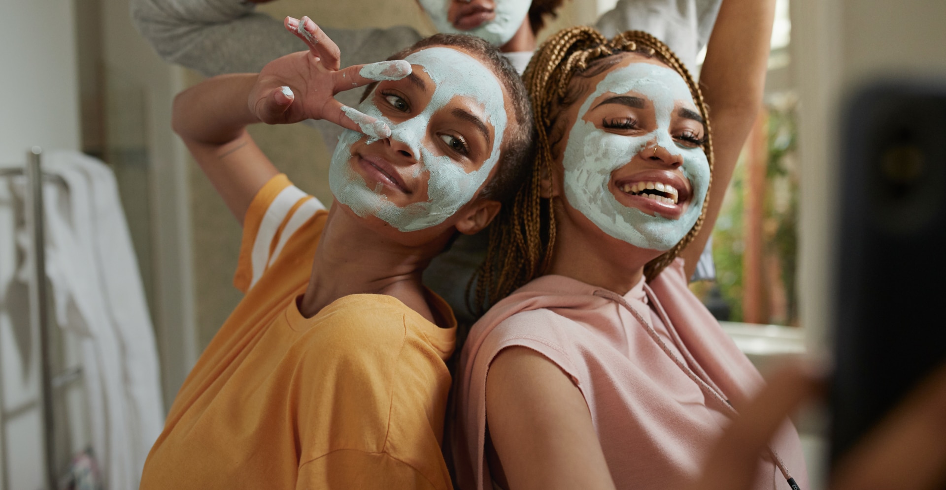 young girls with face masks